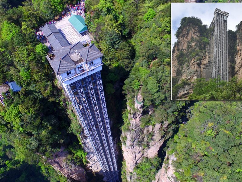 Striking aerial pictures show China's 1,070-foot-tall glass elevator built on the side of a cliff